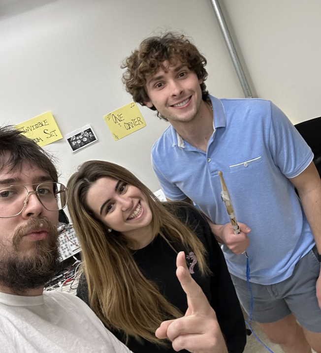 Project creators, Emmett and Marina, posing with drumsticks. Learn more about the team members here